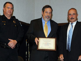 Dr. Mike fuljenz with press club awards